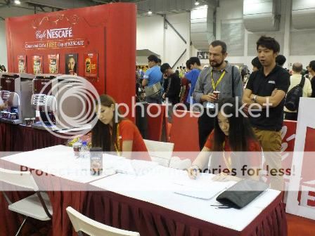 Ji Hyun (Left) with fellow Raffles Alumnus, Cathy, doing coffee caricatures for Nescafé at Anime Festival Asia 2012. Korean Alumnus Makes Instant Caricature Out of Instant Coffee interviews