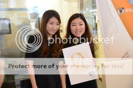Jihyun (left) at the RCHE Open House 2013 Korean Alumnus Makes Instant Caricature Out of Instant Coffee interviews
